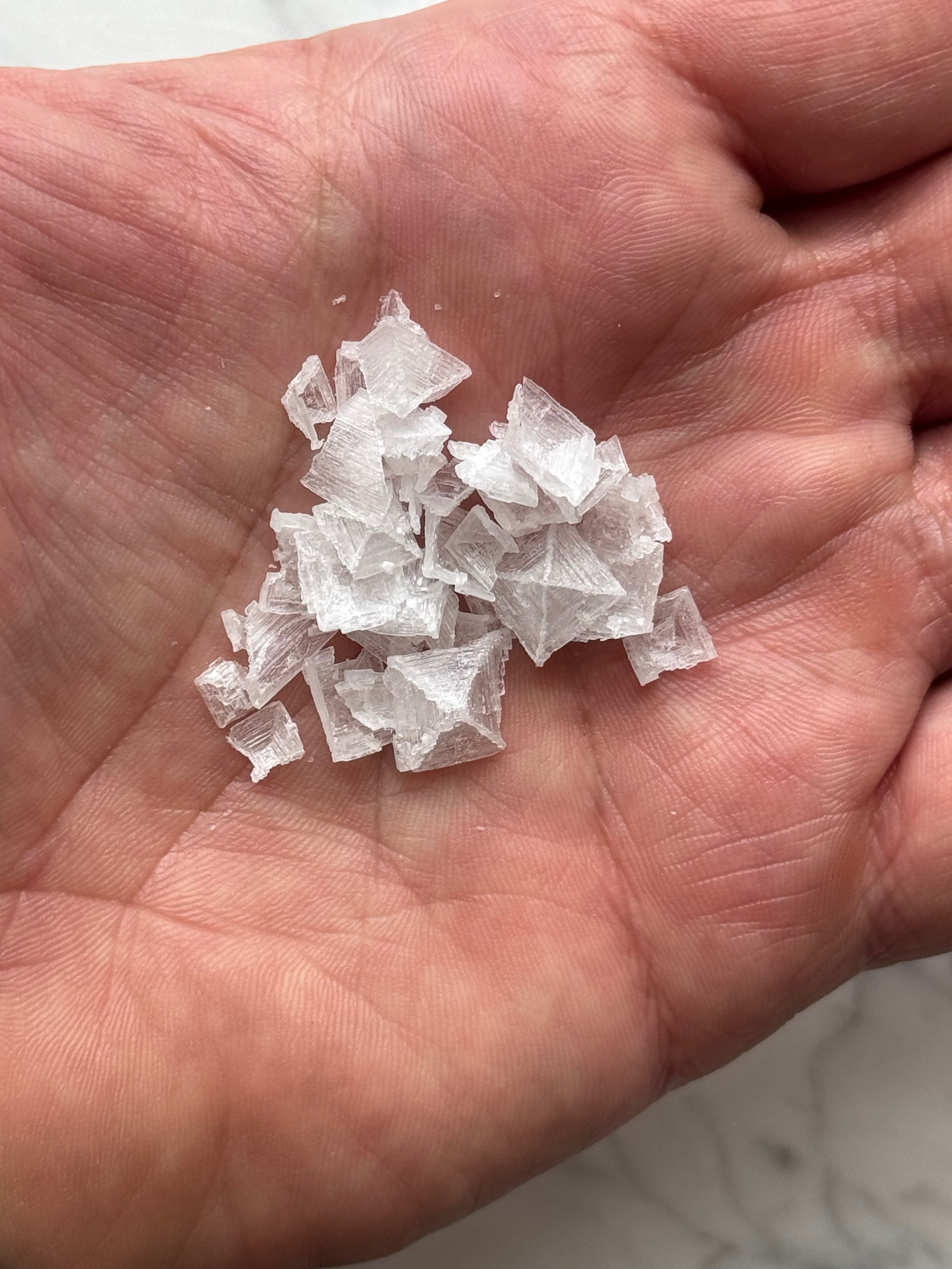 Salt Pyramids in palm of hand