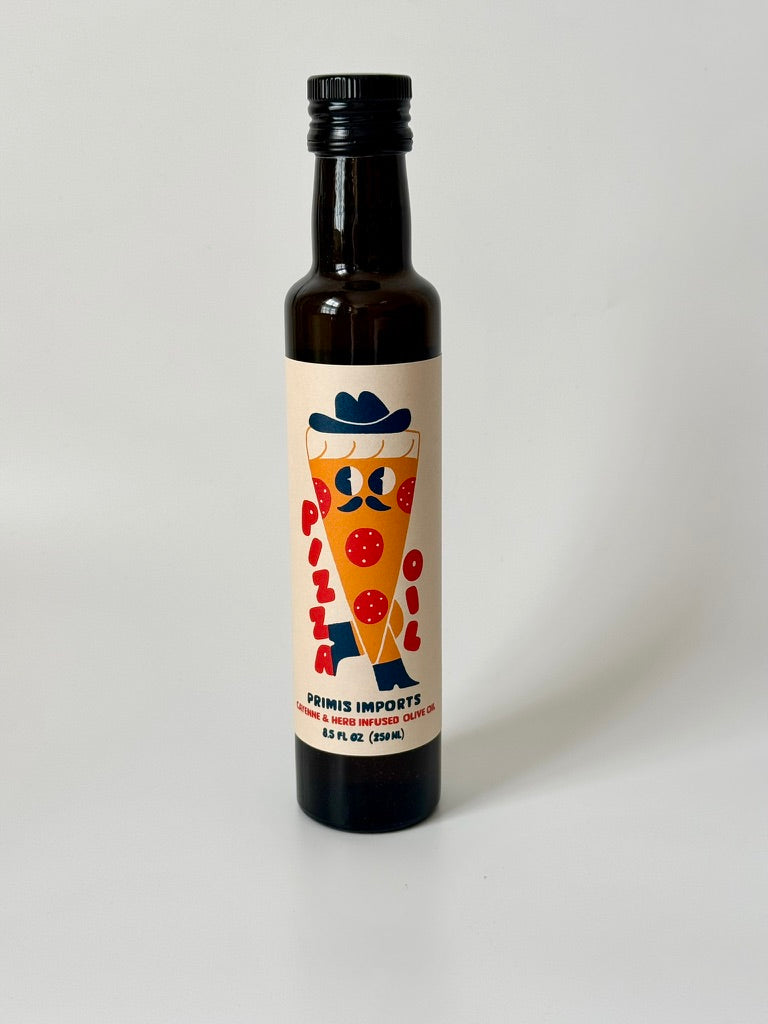 Bottle of olive oil with a colorful label on a white background